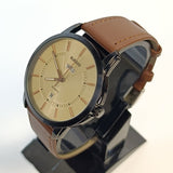 Rado watch with brown leather strap on a stand against a white background