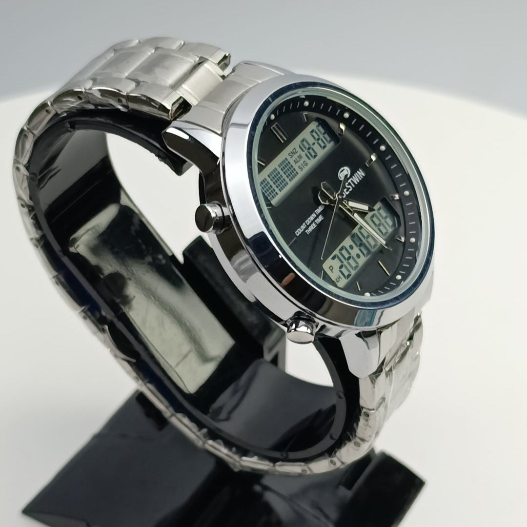 Digital wristwatch on a black stand with a gray background