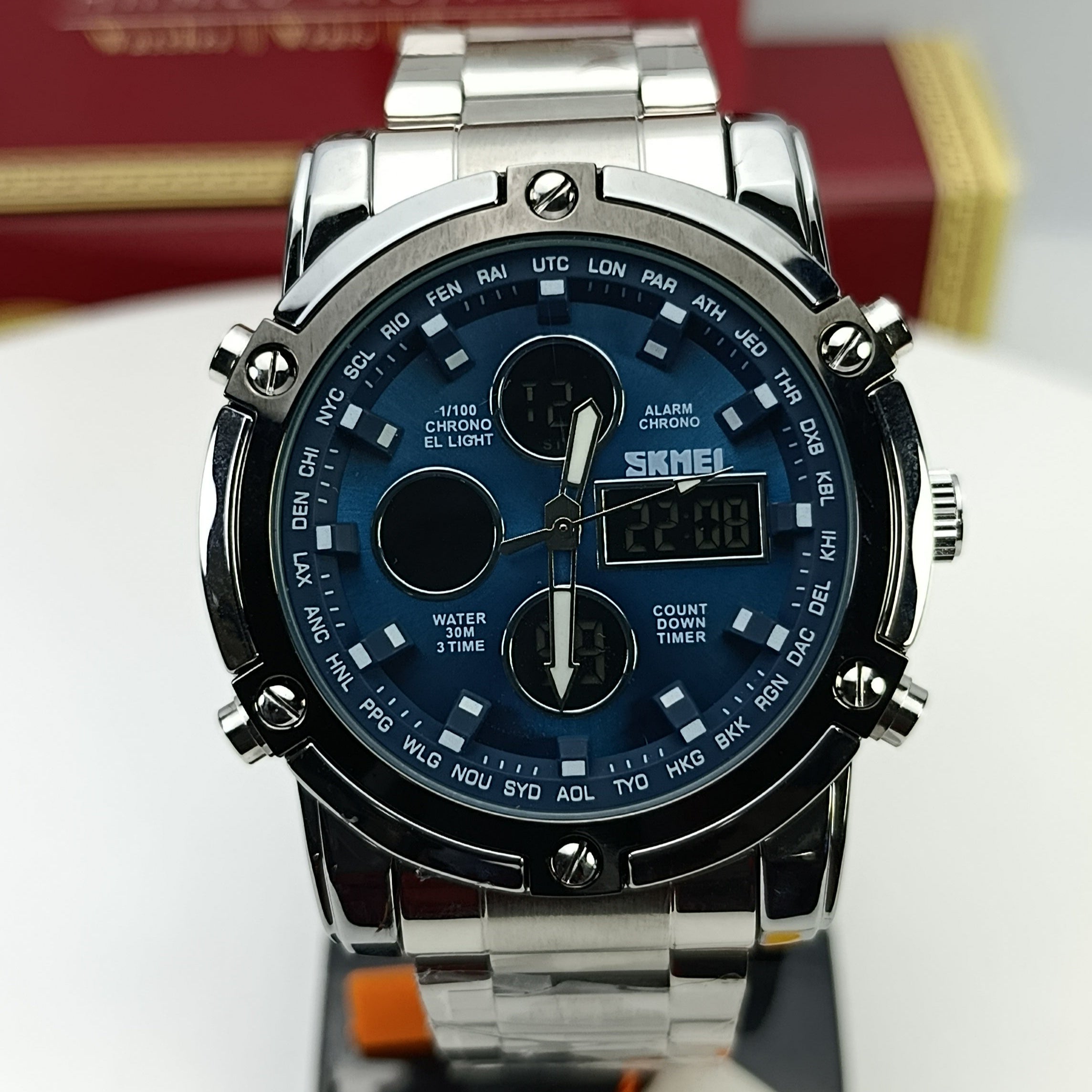 Silver and blue watch with brand logo in the background