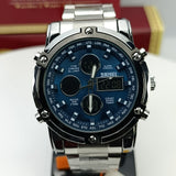 Silver and blue watch with brand logo in the background